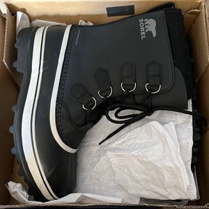 Black and white size 10 Caribou Boots